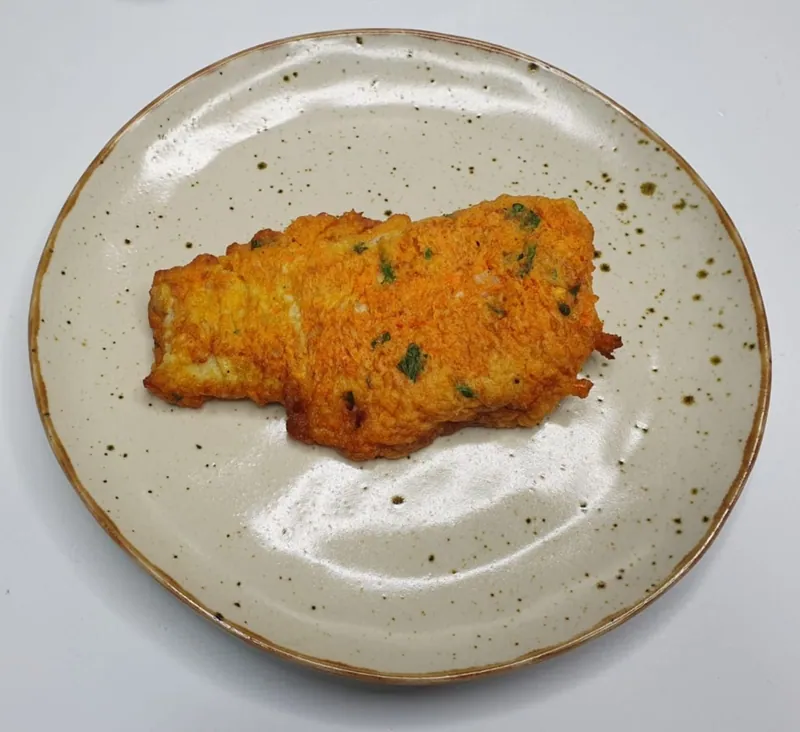 Хек в морковном кляре